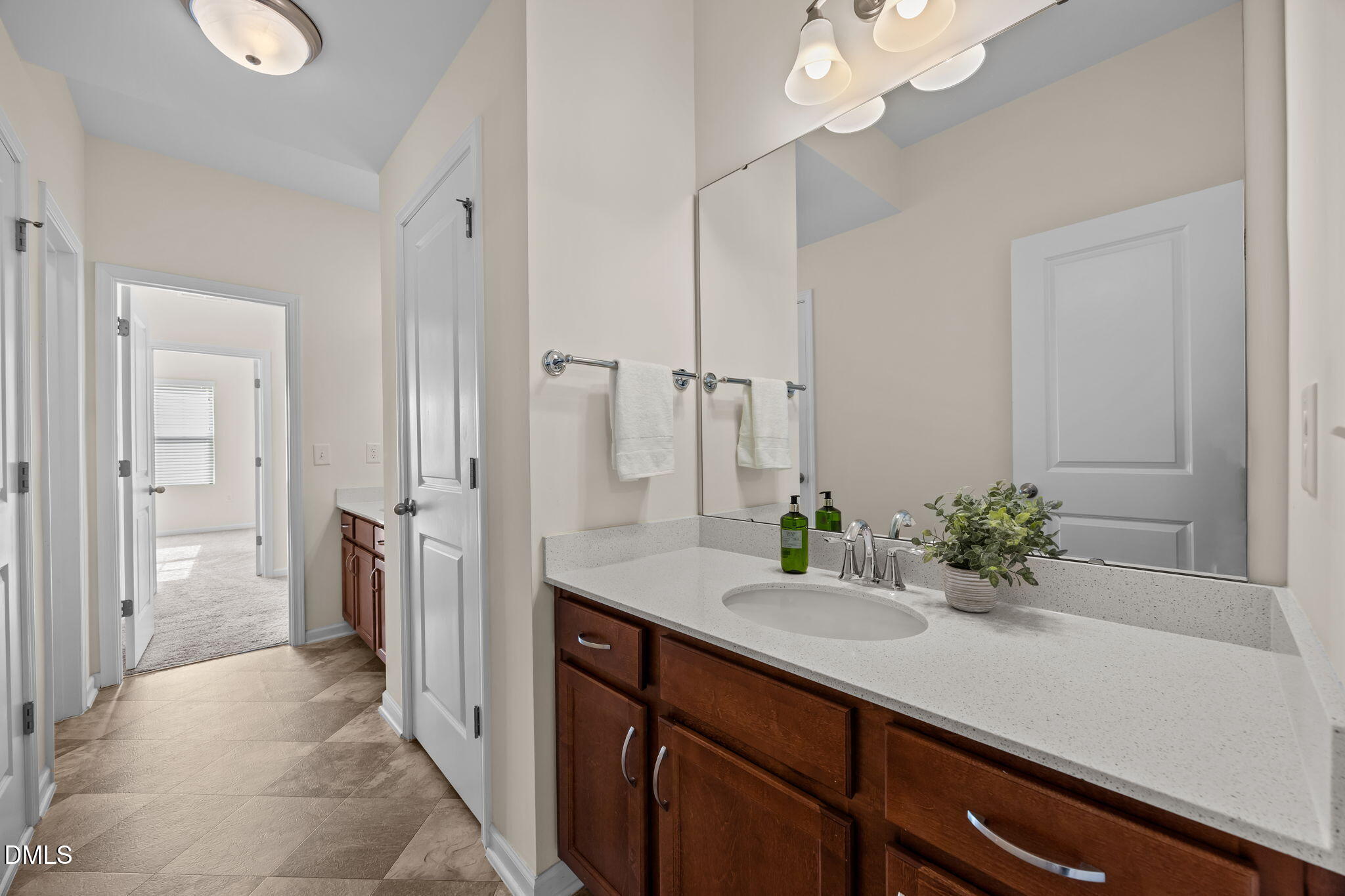 1001 Epiphany Road Morrisville, NC 27560 - Photo 25 of 39 a bathroom with a sink and a mirror