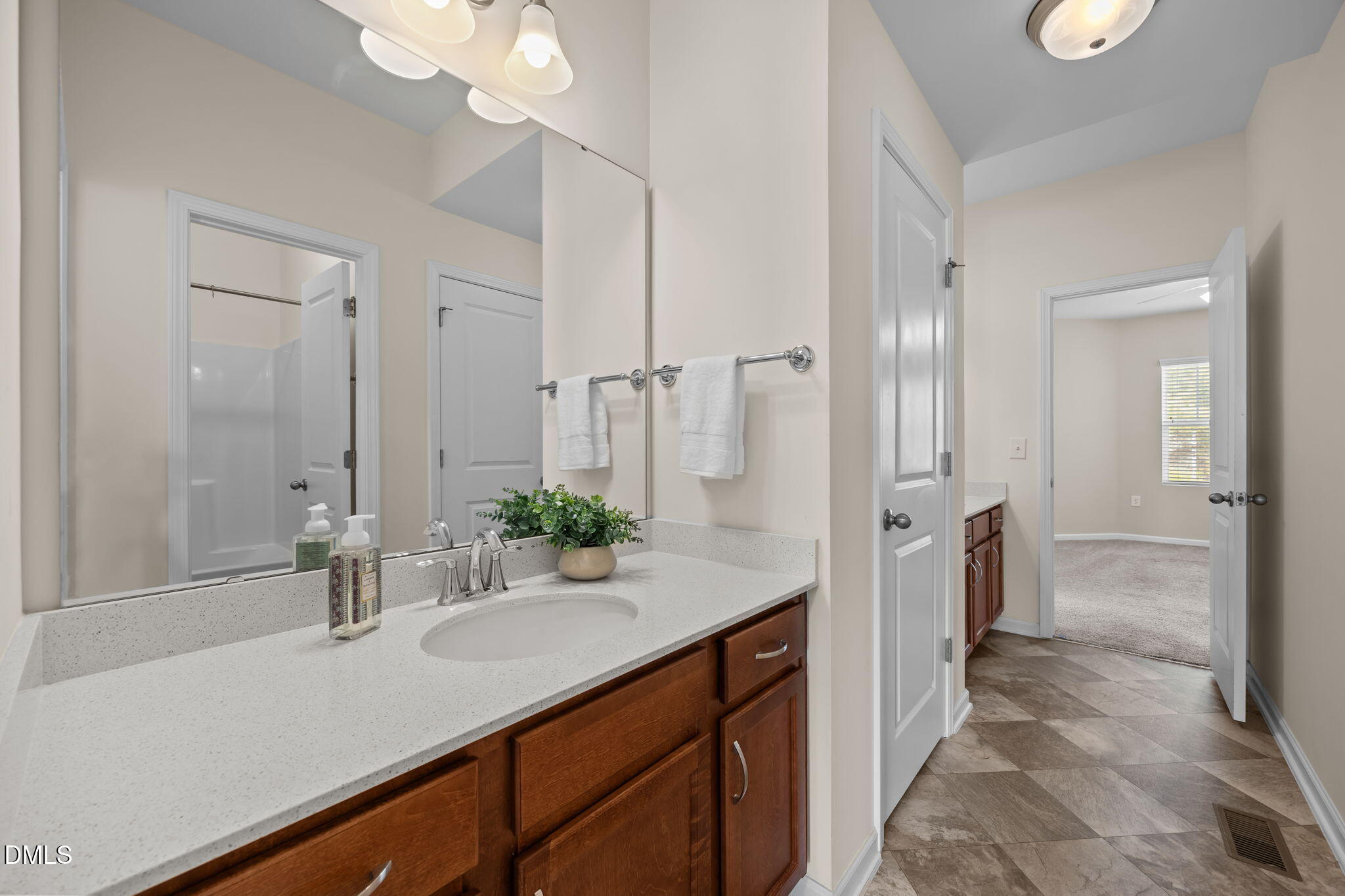 1001 Epiphany Road Morrisville, NC 27560 - Photo 26 of 39 a bathroom with a sink and a mirror