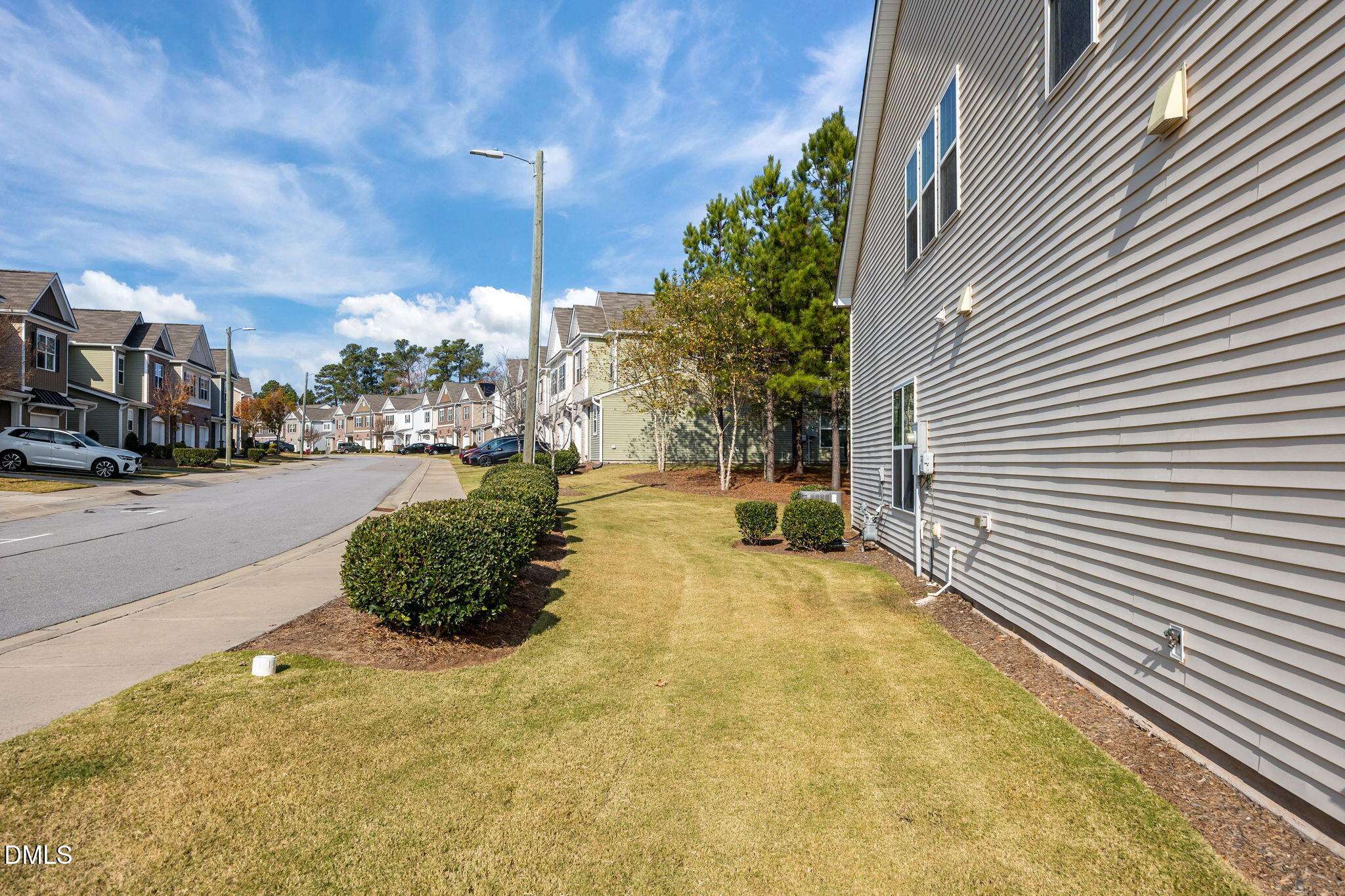 1001 Epiphany Road Morrisville, NC 27560 - Photo 31 of 39 a view of a street with houses on both side of it