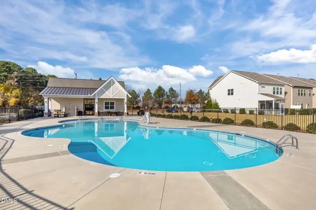 a view of a house with a swimming pool