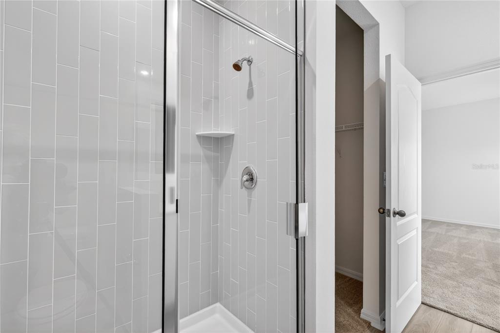 13430 Leaping Water Way Astatula, FL 34705 - Photo 24 of 55 a bathroom with a shower