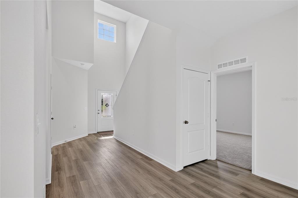 13430 Leaping Water Way Astatula, FL 34705 - Photo 25 of 55 a view of entryway with wooden floor