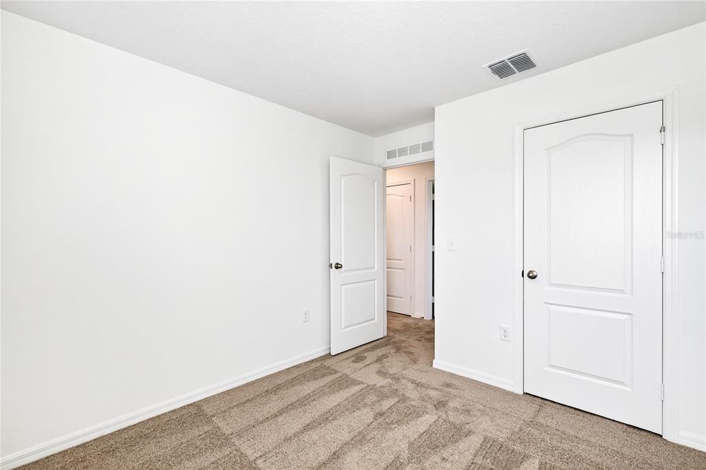 13430 Leaping Water Way Astatula, FL 34705 - Photo 32 of 55 a view of an empty room