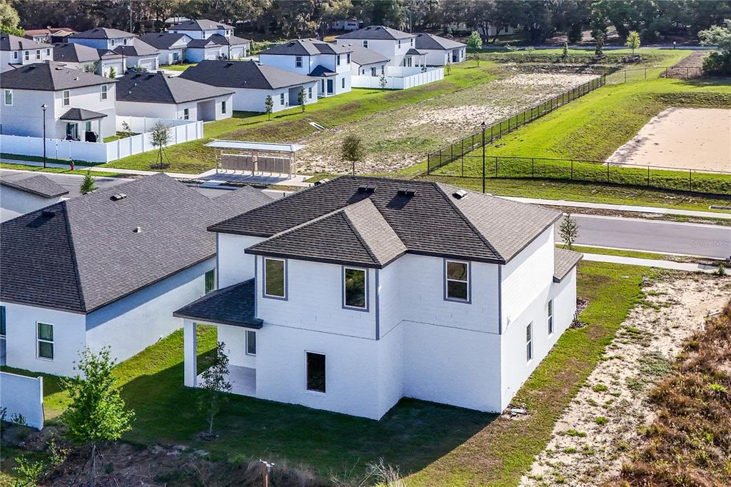 13430 Leaping Water Way Astatula, FL 34705 - Photo 47 of 55 an aerial view of a house with a swimming pool