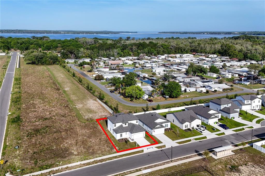 13430 Leaping Water Way Astatula, FL 34705 - Photo 53 of 55 an aerial view of residential houses with outdoor space