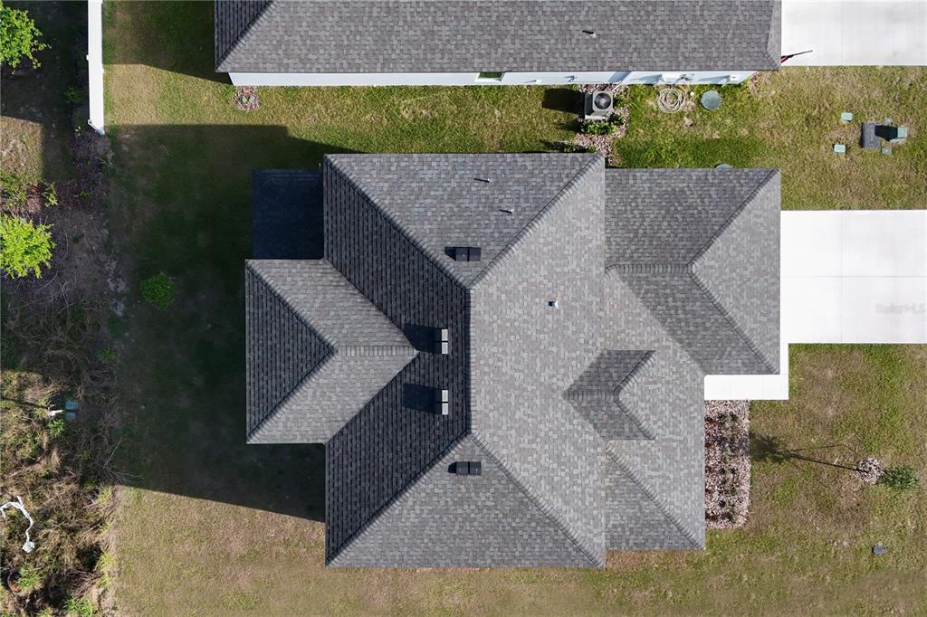 13430 Leaping Water Way Astatula, FL 34705 - Photo 54 of 55 an aerial view of a house with a yard