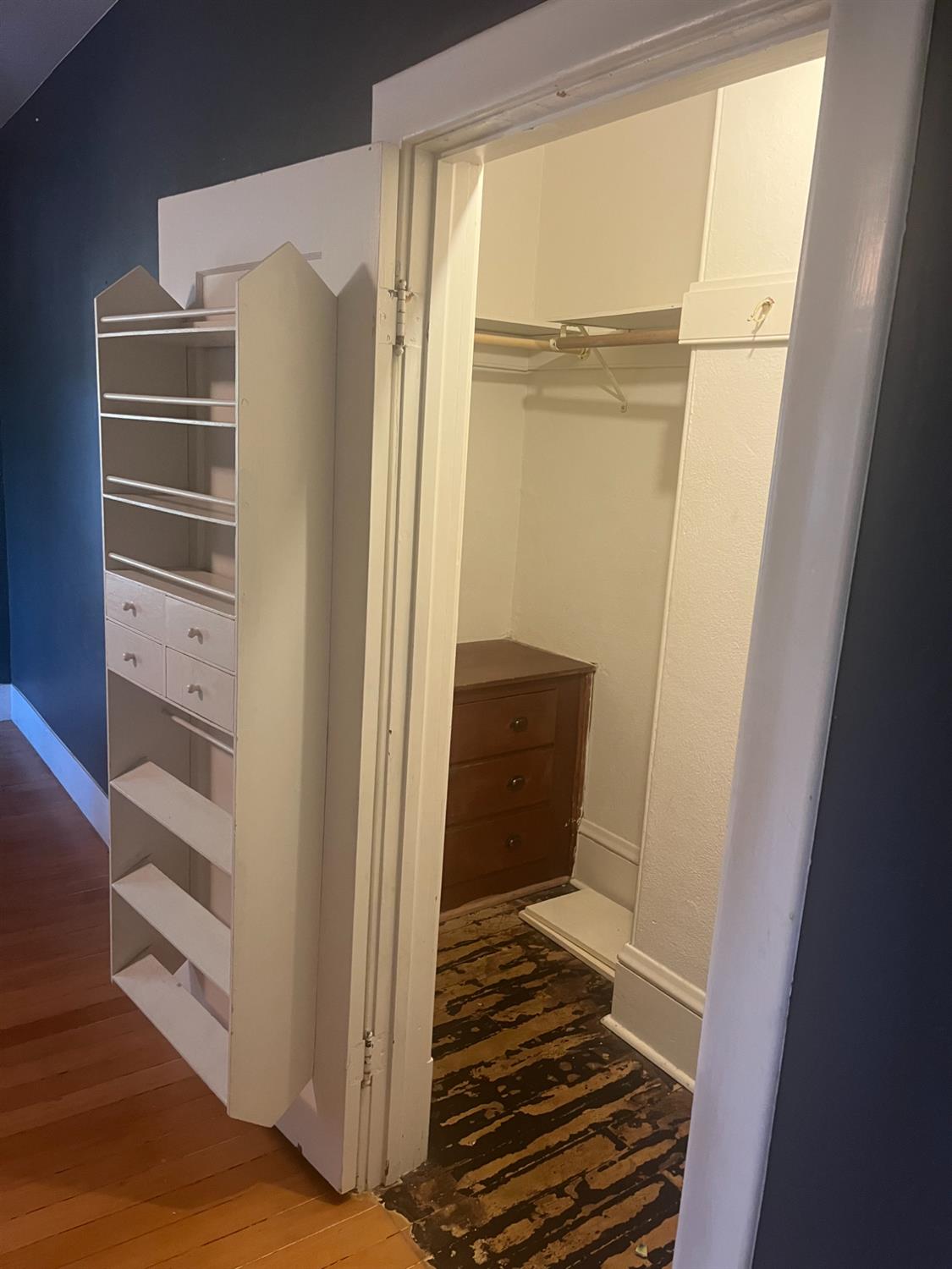 1205 P Street Newman, CA 95360 - Photo 2 of 6 a view of walk in closet with empty racks