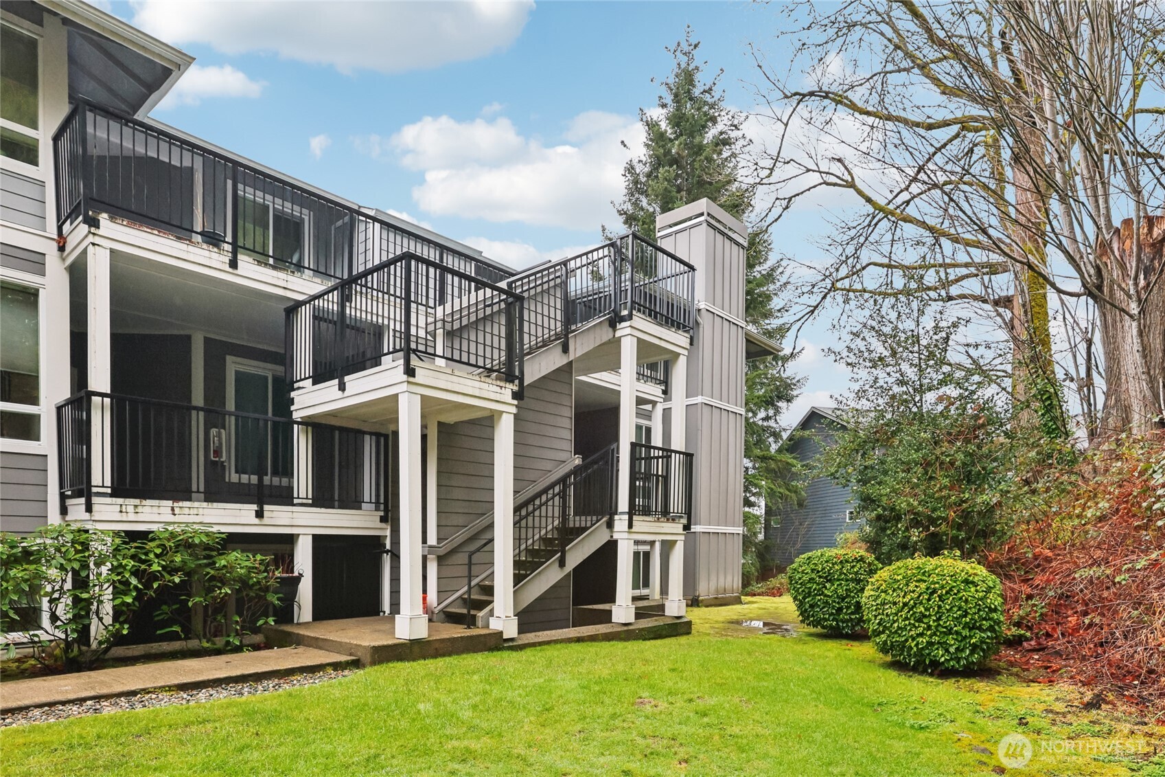 front view of a house with a yard