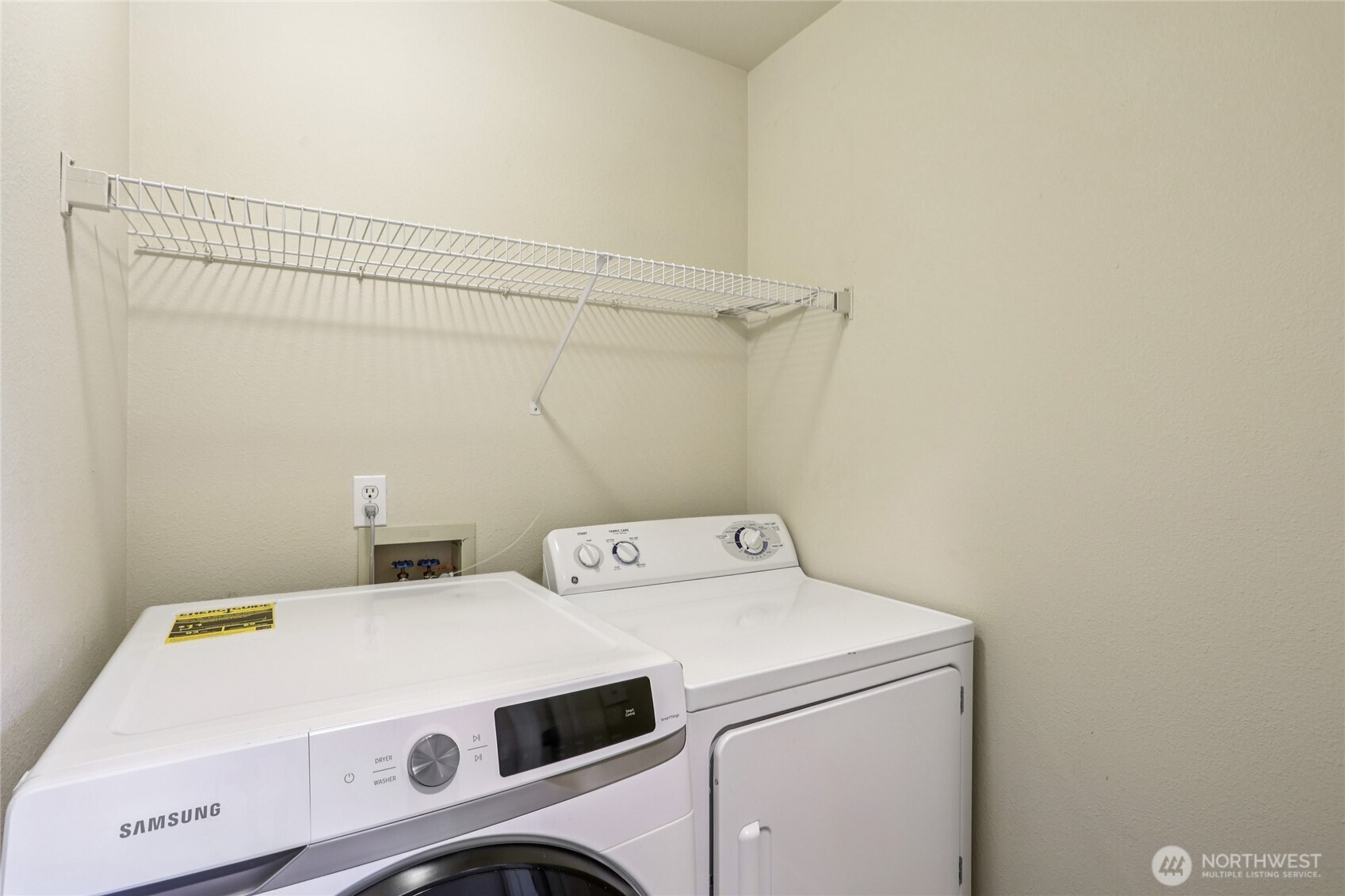 3927 243rd Place Southeast, Unit I304 Bothell, WA 98021 - Photo 17 of 28 a utility room with dryer and washer