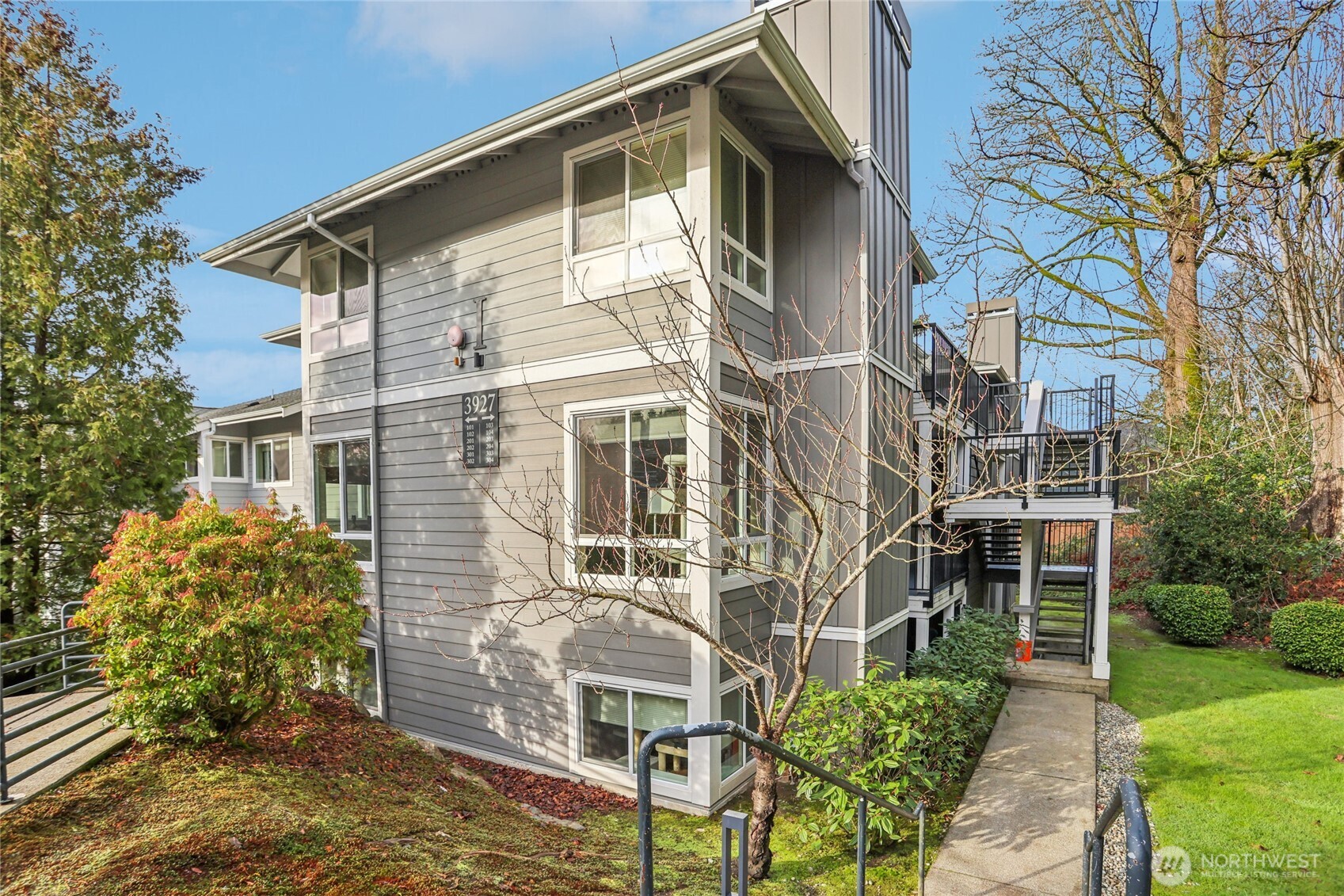 3927 243rd Place Southeast, Unit I304 Bothell, WA 98021 - Photo 2 of 28 front view of a house with a yard