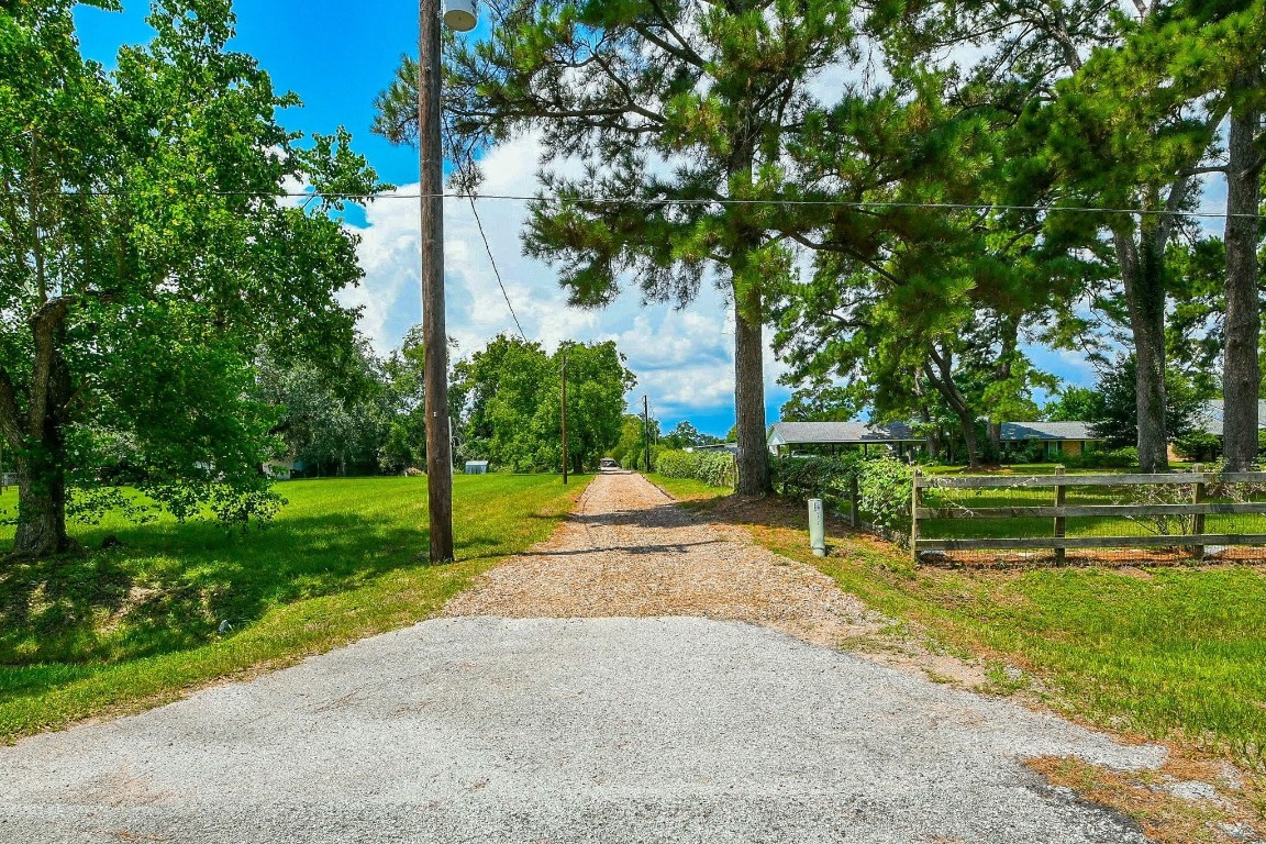 View from the street going up the private driveway