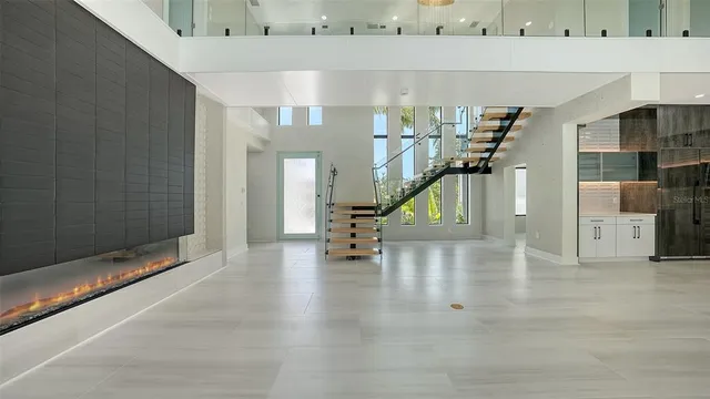 a bathroom with a toilet sink vanity and mirror