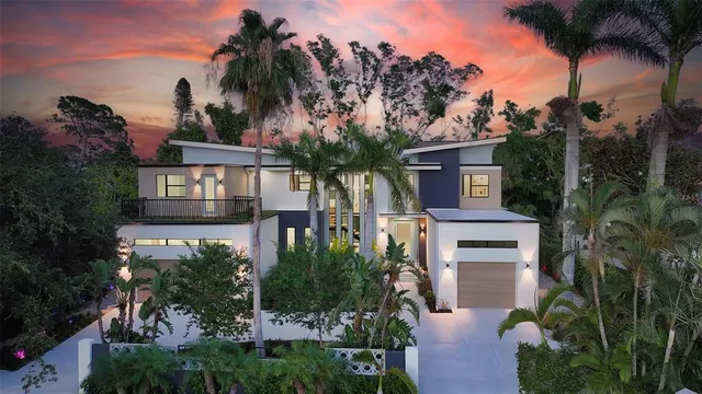 a view of a living room and kitchen