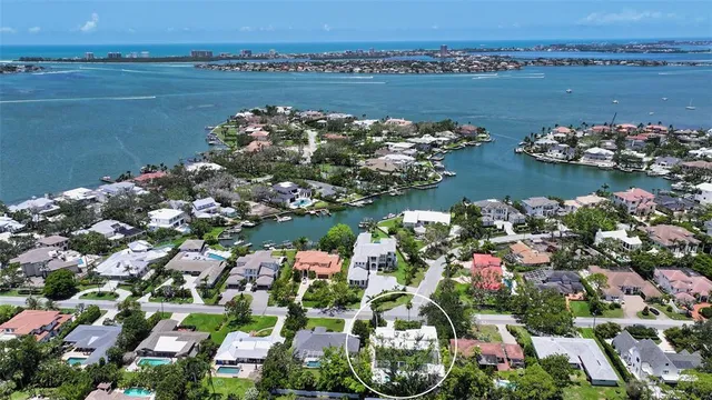 a bathroom with sink shower and mirror
