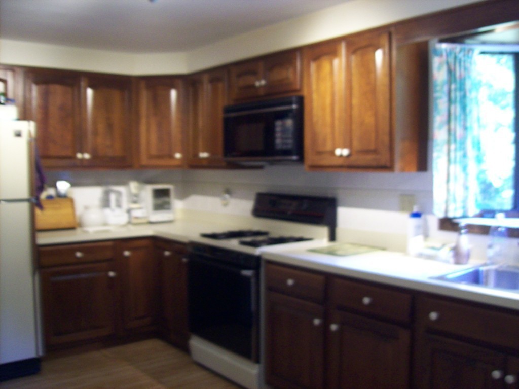 19 No Name Road Stow, MA 01775 - Photo 5 of 21 a kitchen with a sink a stove and cabinets