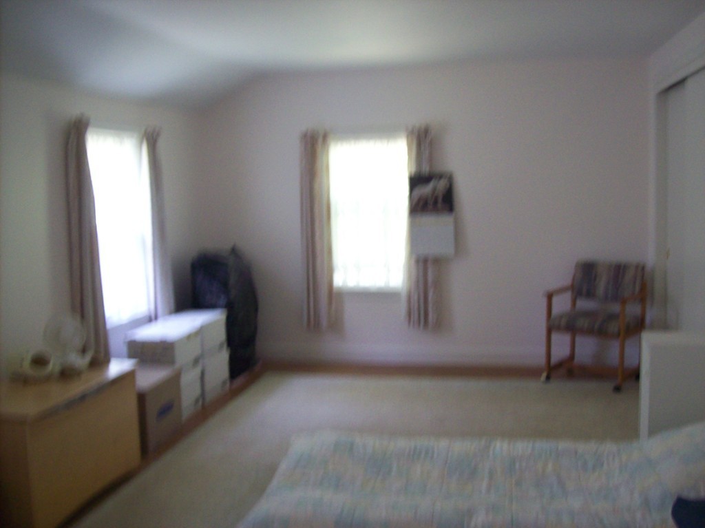 19 No Name Road Stow, MA 01775 - Photo 8 of 21 a living room with furniture and a window