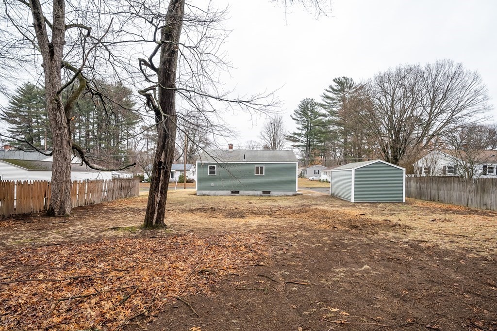 152 Shady Brook Lane Springfield, MA 01118 - Photo 26 of 26 a house with a tree in the background