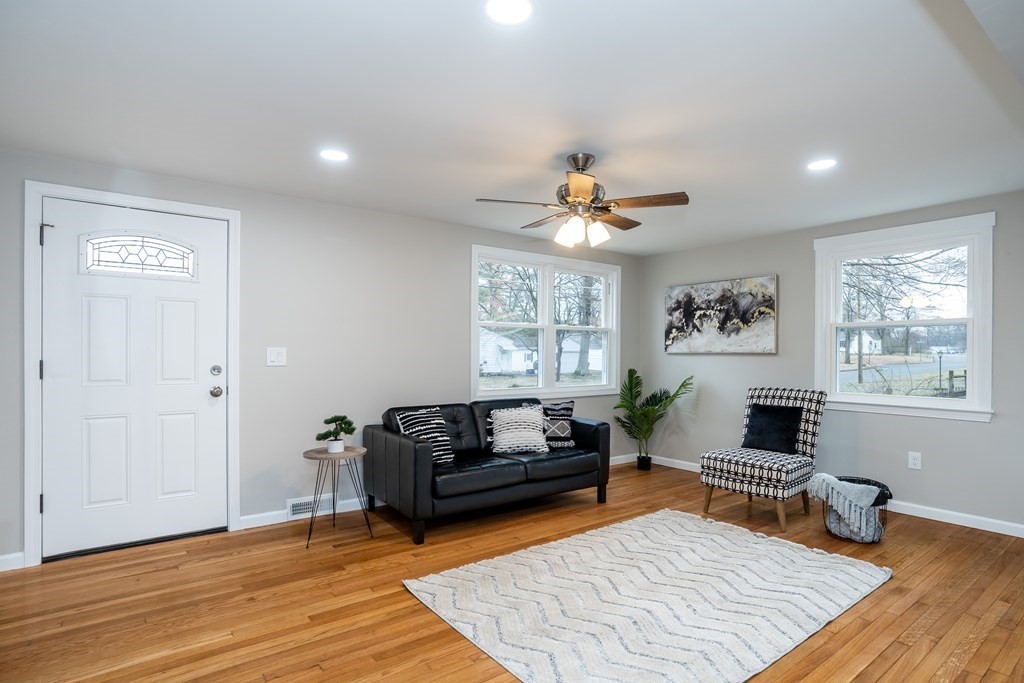 152 Shady Brook Lane Springfield, MA 01118 - Photo 7 of 26 a living room with furniture and a window