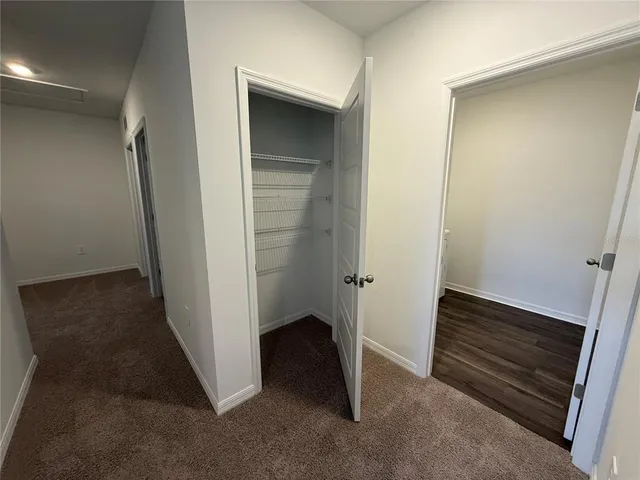 an entryway view with hallway in a room