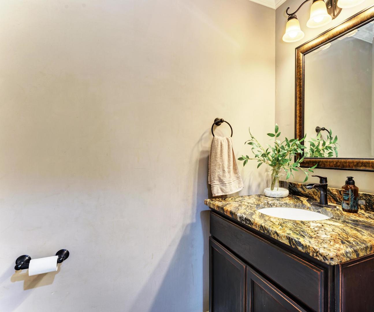 2210 Ridge Avenue Aurora, IL 60504 - Photo 15 of 29 a bathroom with a granite countertop sink and a mirror