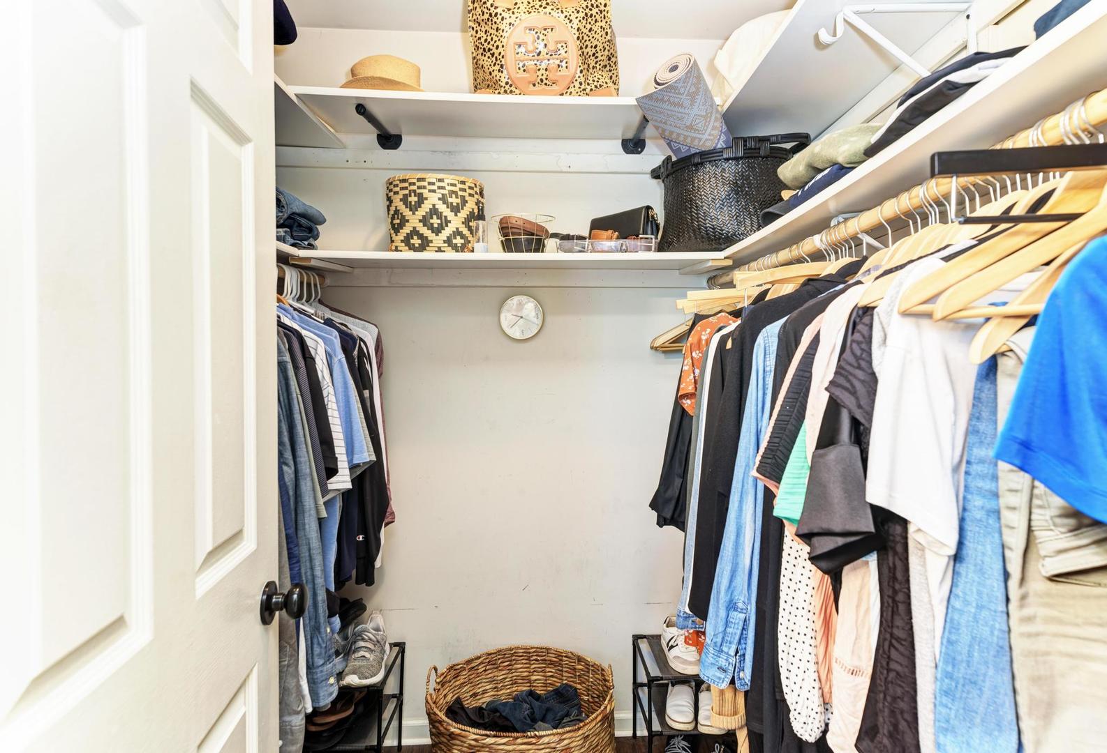 2210 Ridge Avenue Aurora, IL 60504 - Photo 20 of 29 a view of walk in closet with clothes and shoes