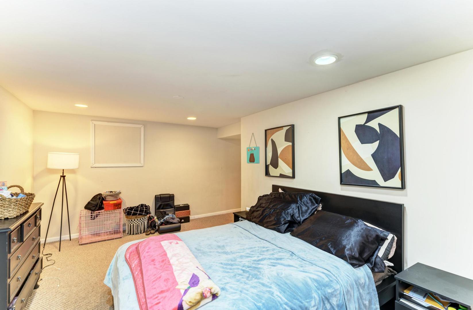 2210 Ridge Avenue Aurora, IL 60504 - Photo 28 of 29 a bed room with a bed and a gym