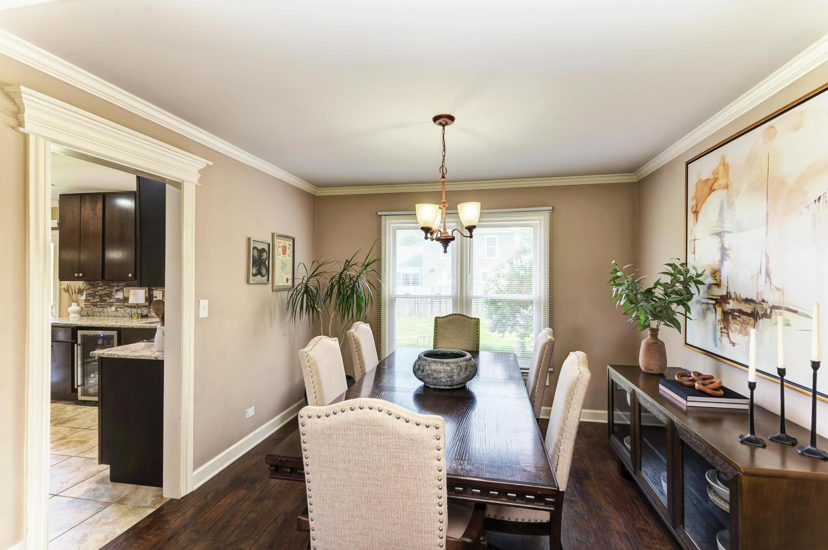 2210 Ridge Avenue Aurora, IL 60504 - Photo 5 of 29 a view of a dining room with furniture window and wooden floor