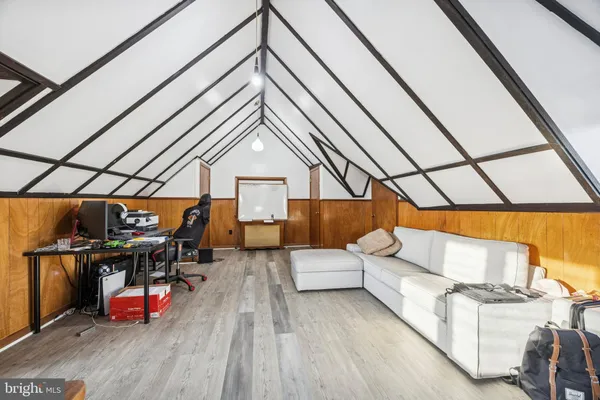 an outdoor living room with furniture