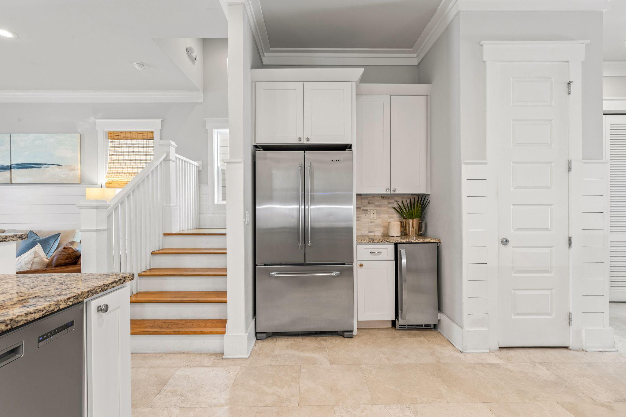 51 Trigger Trail East Inlet Beach, FL 32461 - Photo 16 of 57 a kitchen with cabinets and stainless steel appliances