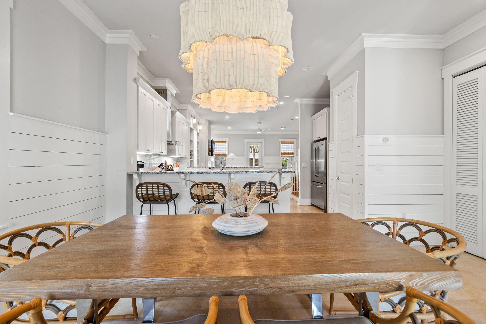 51 Trigger Trail East Inlet Beach, FL 32461 - Photo 18 of 57 a view of a dining room with furniture and a chandelier