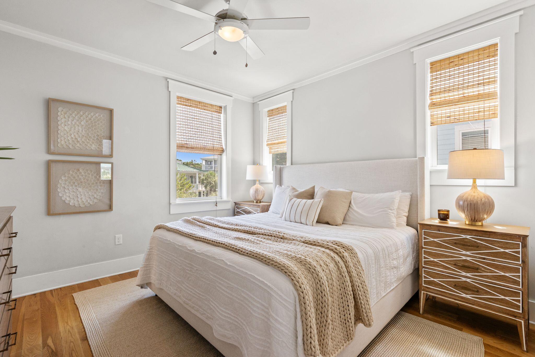 51 Trigger Trail East Inlet Beach, FL 32461 - Photo 21 of 57 a bedroom with a bed and a window