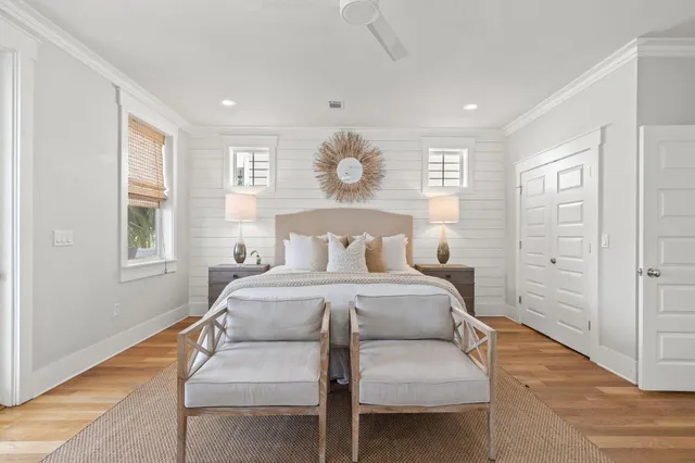 a bedroom with bed and window