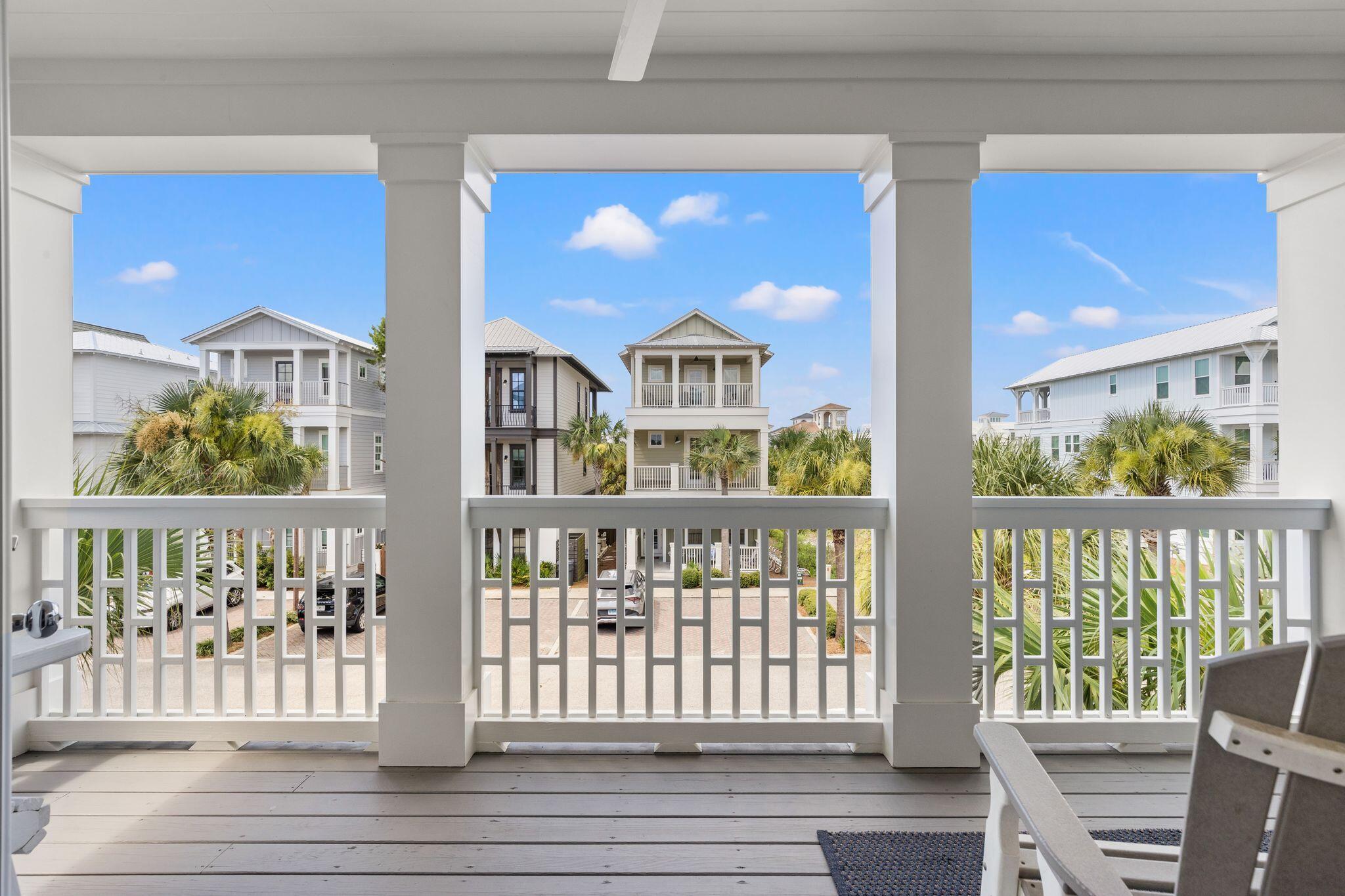 51 Trigger Trail East Inlet Beach, FL 32461 - Photo 34 of 57 a view of a porch with wooden floor and outdoor seating