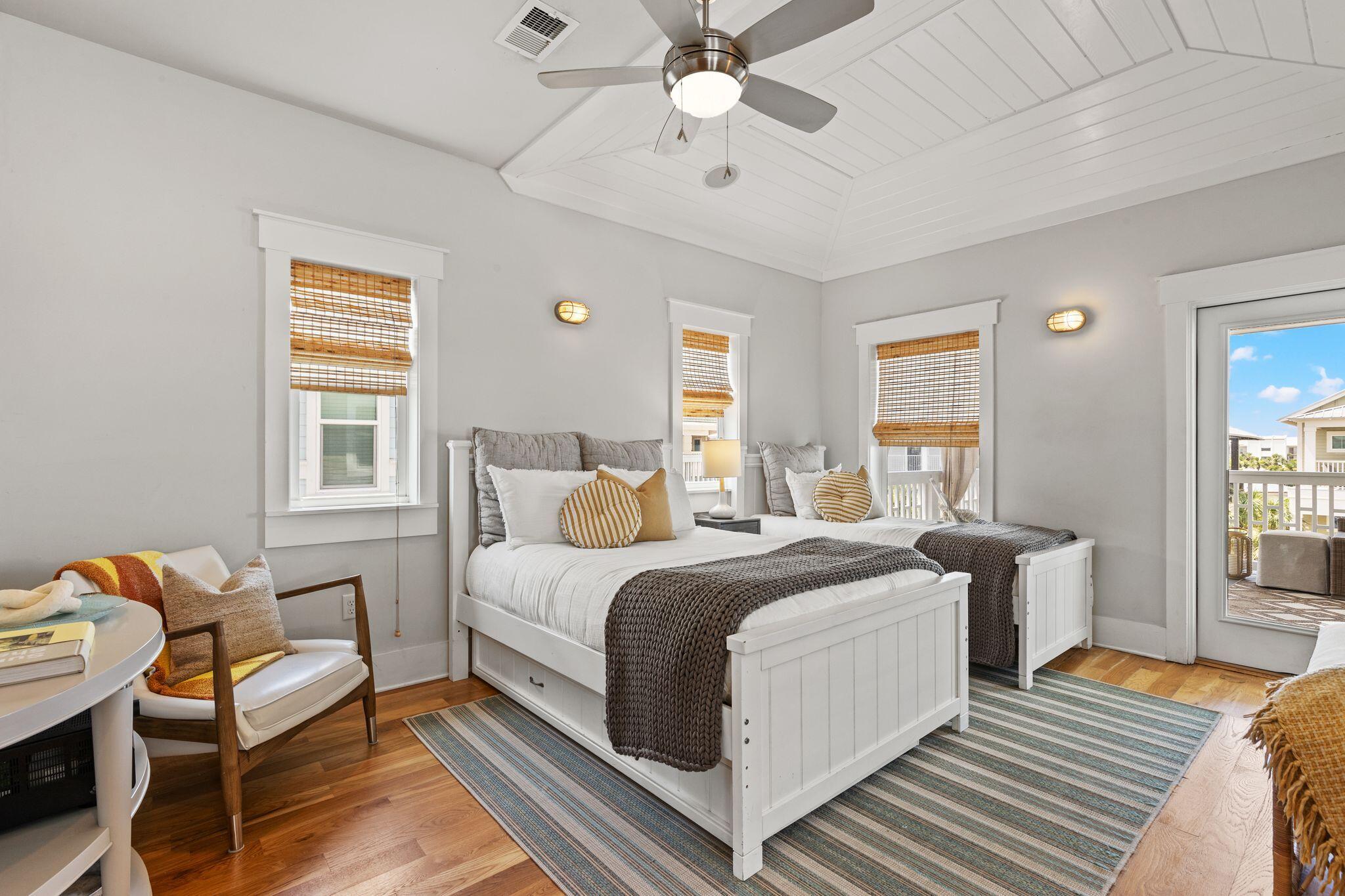 51 Trigger Trail East Inlet Beach, FL 32461 - Photo 39 of 57 a bedroom with a bed and wooden floor