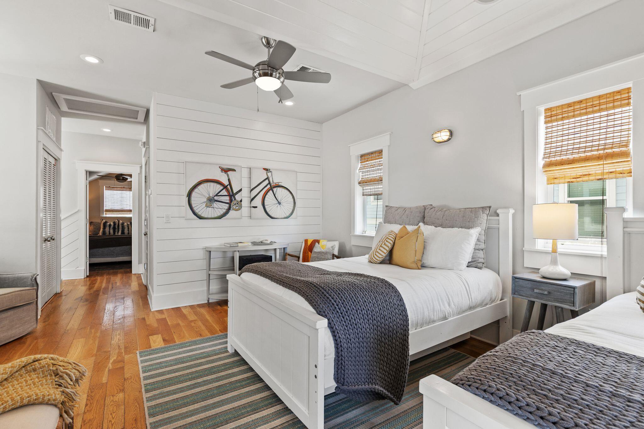 51 Trigger Trail East Inlet Beach, FL 32461 - Photo 41 of 57 a bedroom with two beds and a chandelier