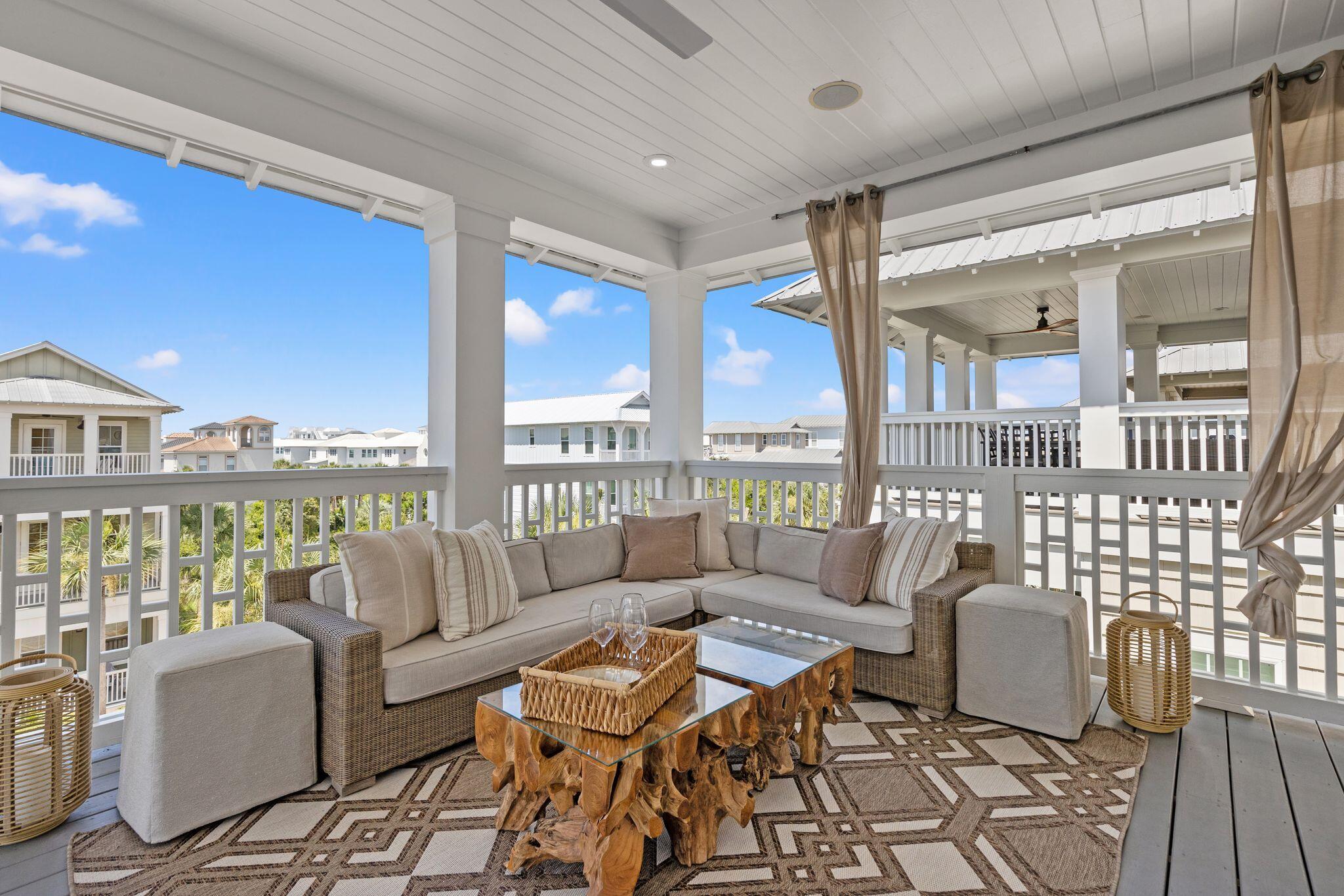 51 Trigger Trail East Inlet Beach, FL 32461 - Photo 45 of 57 a living room with furniture and a floor to ceiling window