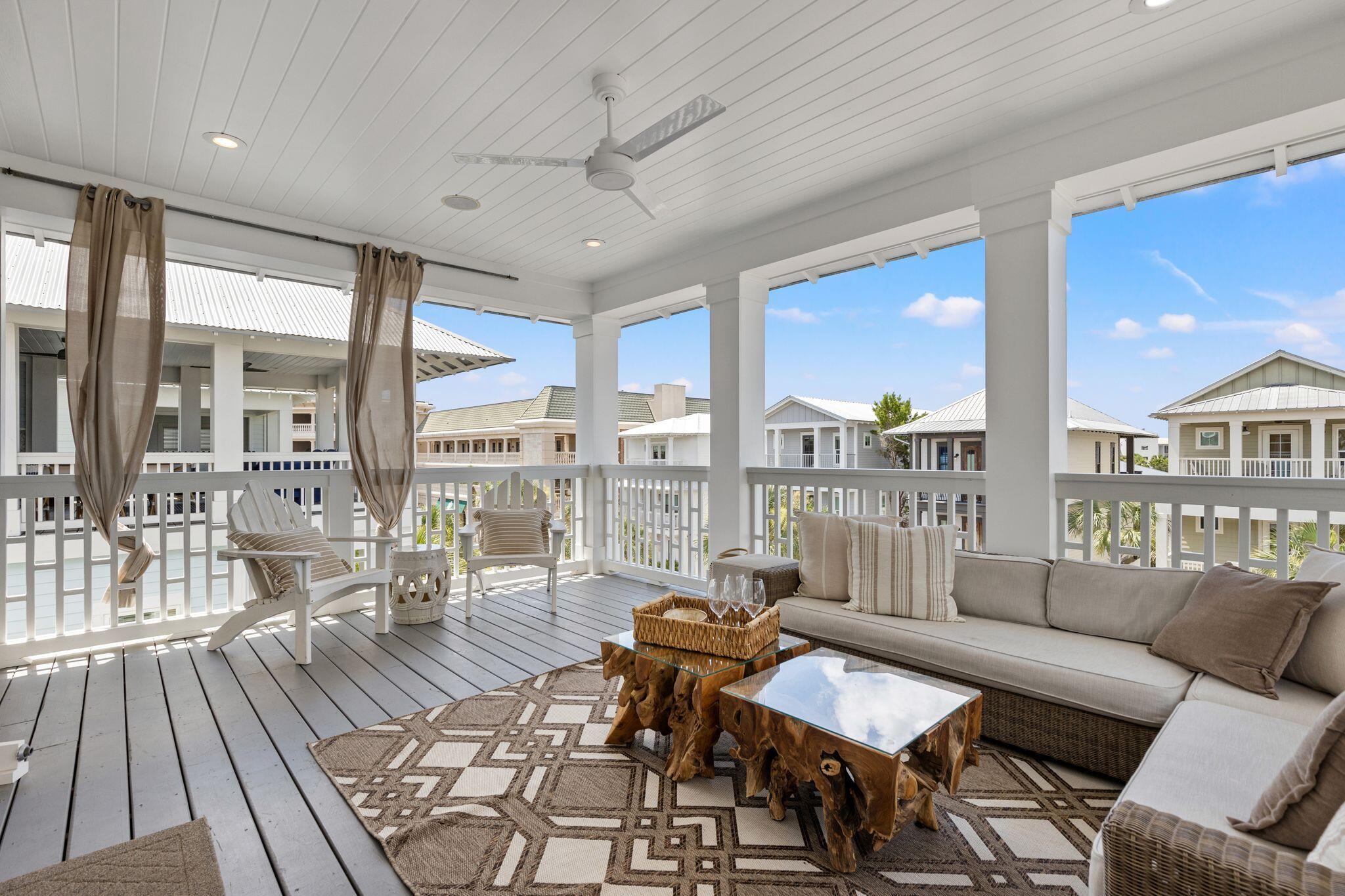 51 Trigger Trail East Inlet Beach, FL 32461 - Photo 48 of 57 a living room with furniture and floor to ceiling windows