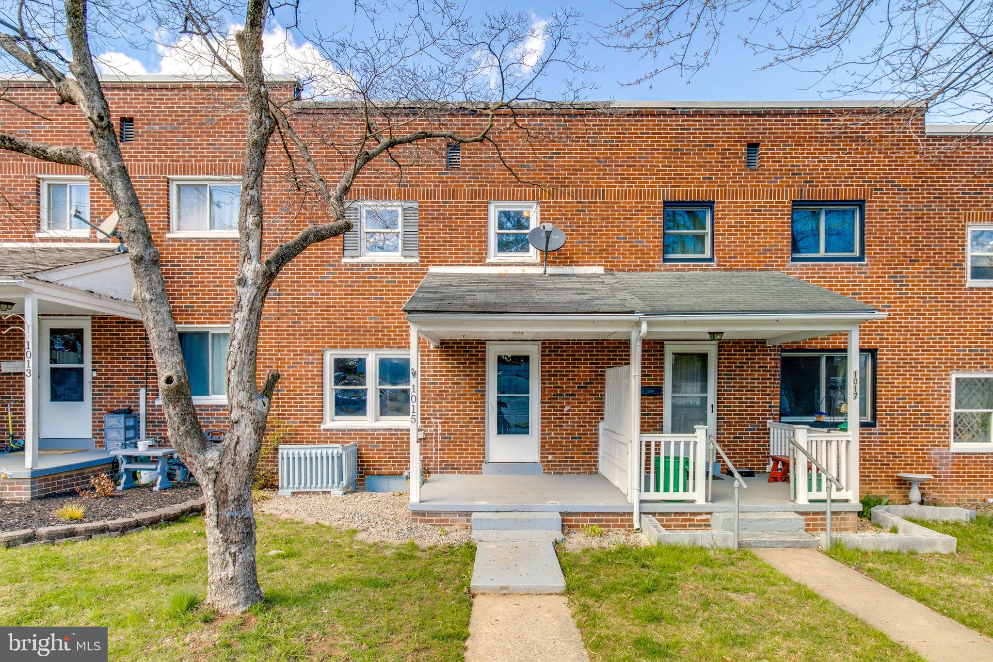 1015 Clark Street Lancaster, PA 17602 - Photo 1 of 14 a front view of a house with garden
