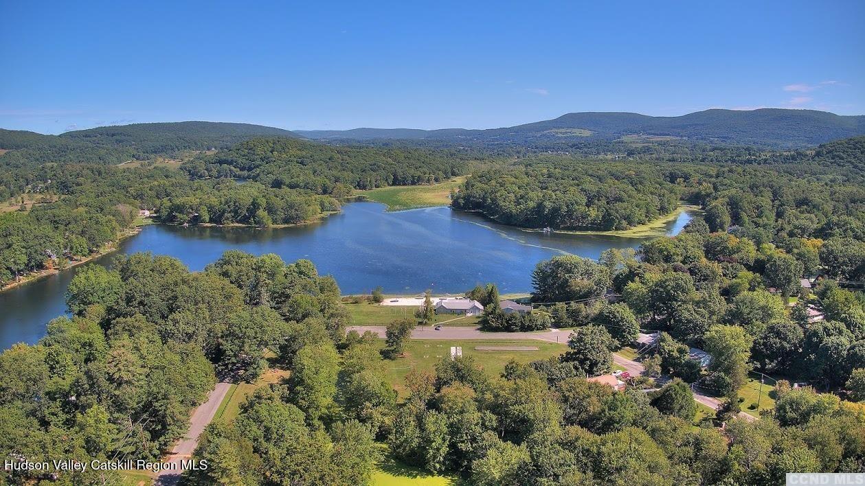 0 Taft Road, Unit LOT 204 Copake, NY 12516 - Photo 4 of 9 a view of lake with mountain