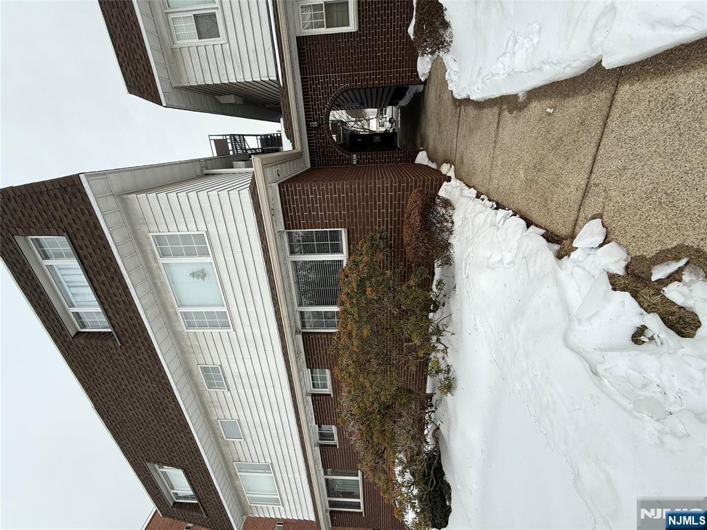 101 Orient Way, Unit 2C1 Rutherford, NJ 07070 - Photo 12 of 12 a front view of a house with a yard