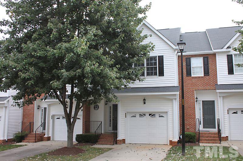 5425 Goldenglow Way Raleigh, NC 27606 - Photo 1 of 17 a front view of a house with garage