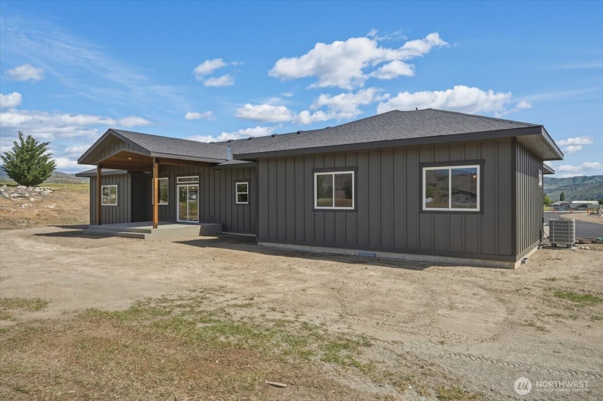110 Slide View Lane Manson, WA 98831 - Photo 4 of 38 a view of a house with a yard
