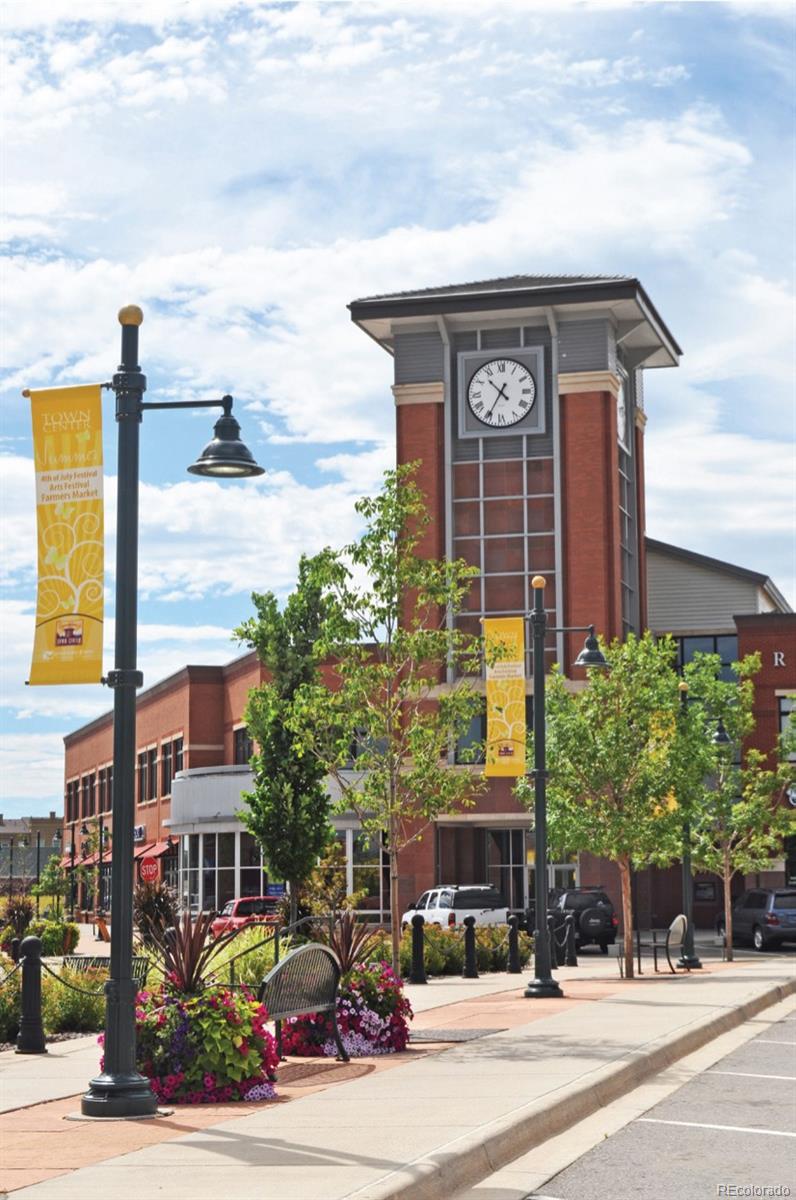 669 Walden Court Highlands Ranch, CO 80126 - Photo 29 of 34 a front view of a building with street view