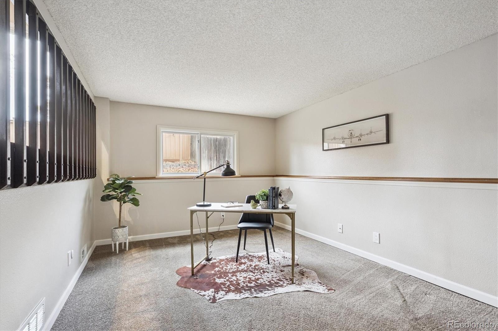 669 Walden Court Highlands Ranch, CO 80126 - Photo 7 of 34 a workspace with furniture and window