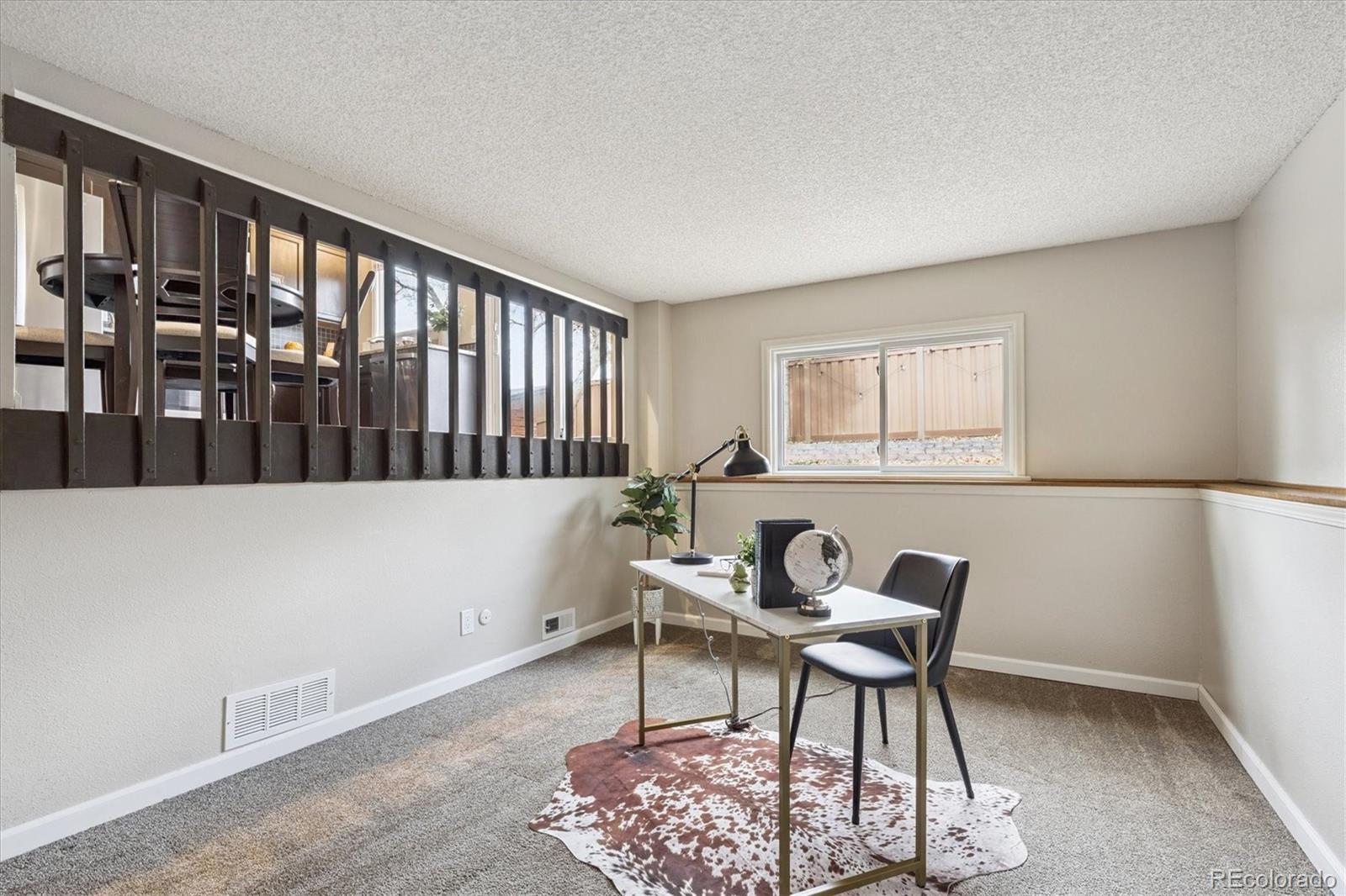 669 Walden Court Highlands Ranch, CO 80126 - Photo 8 of 34 a workspace with furniture and window