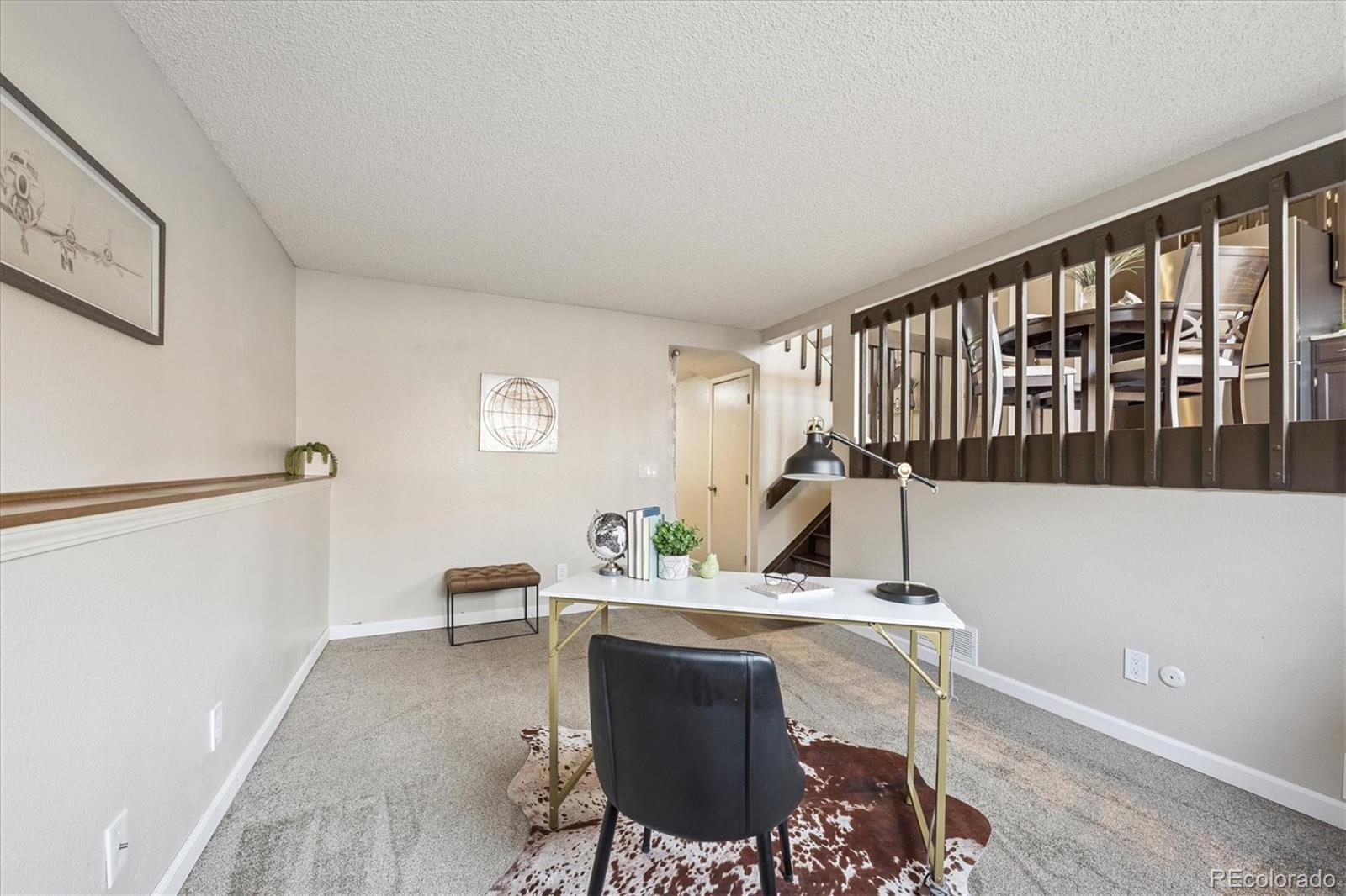 669 Walden Court Highlands Ranch, CO 80126 - Photo 9 of 34 a view of a workspace with furniture