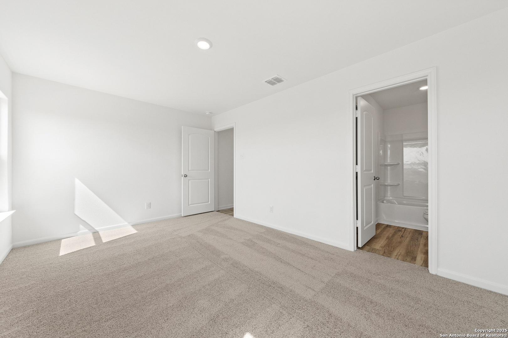 16108 Farmer Lytle, TX 78052 - Photo 11 of 27 an empty room with an entryway