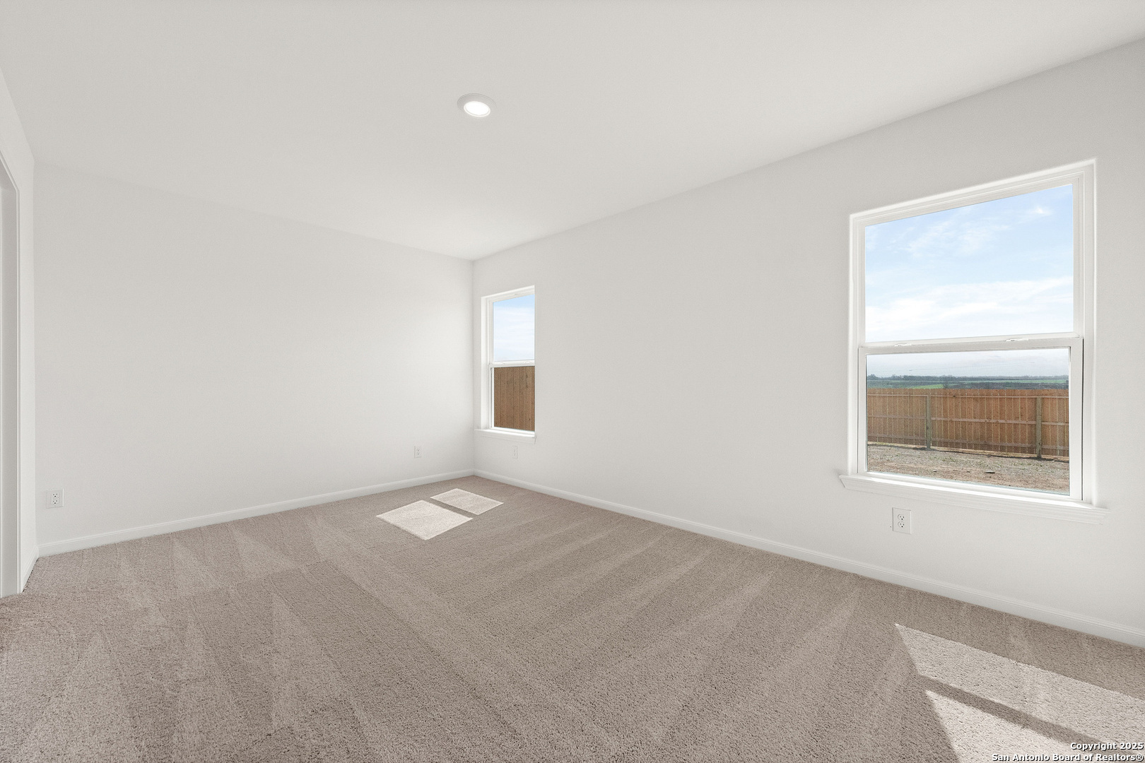 16108 Farmer Lytle, TX 78052 - Photo 10 of 27 an empty room with a window