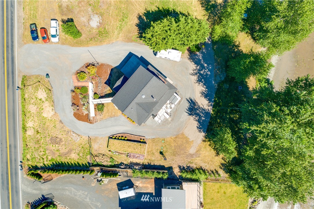 6845 Willow Grove Road Longview, WA 98632 - Photo 27 of 30 an aerial view of a house with a swimming pool