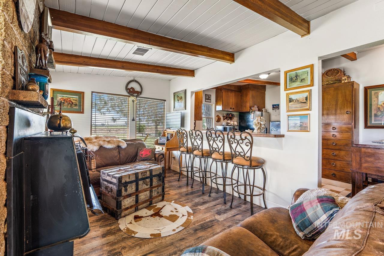 4417 Oak Road Ontario, OR 97914 - Photo 6 of 50 Living room with dark wood-style flooring and beamed ceiling